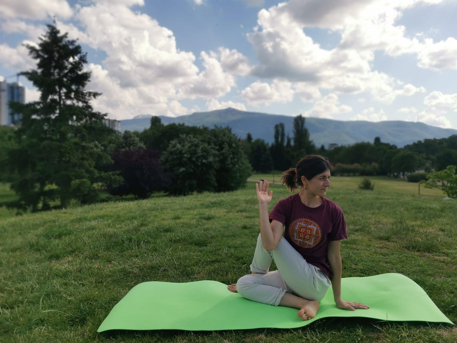 Ardha Matsyendrasana yoga pose outdoors